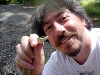 Mik and a sick snake he found near the pond.